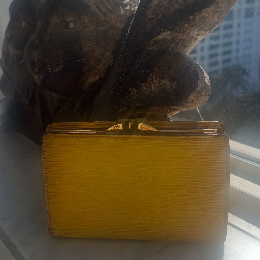 Louis Vuitton Epi Porte Monnaie Billets Viennois wallet in yellow epi leather.